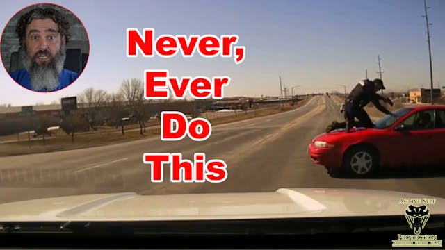 Officer Jumps On Car Hood To Stop A F...