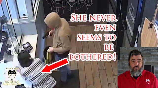 Man Robs Store While Bystander Stands...