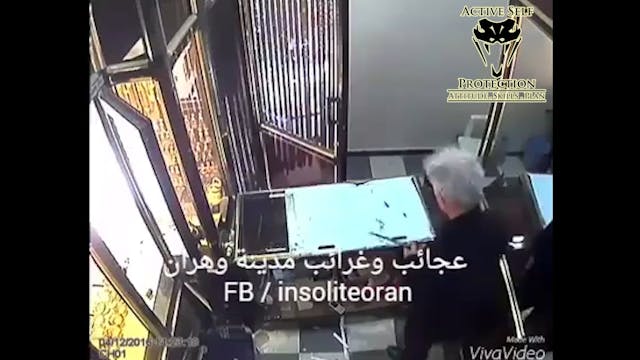 Determined Store Owner Beats Armed Ro...