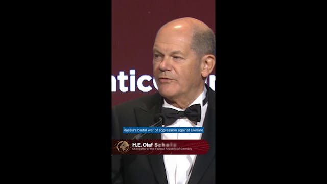 German Chancellor Olaf Scholz accepts...