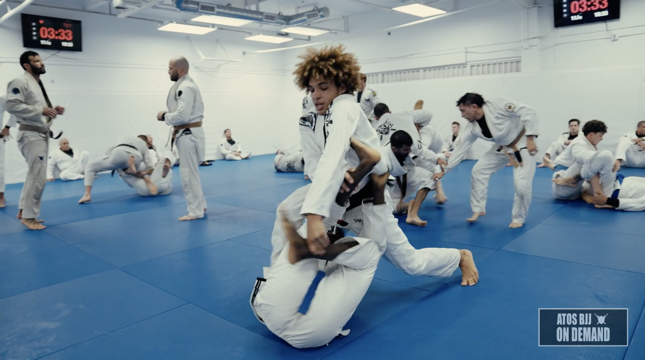 Kade Ruotolo Flow Roll Against Blue Belt