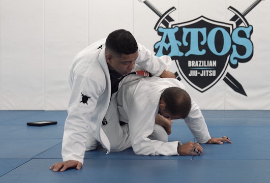Taking the Back From Closed Guard Using the Lapel