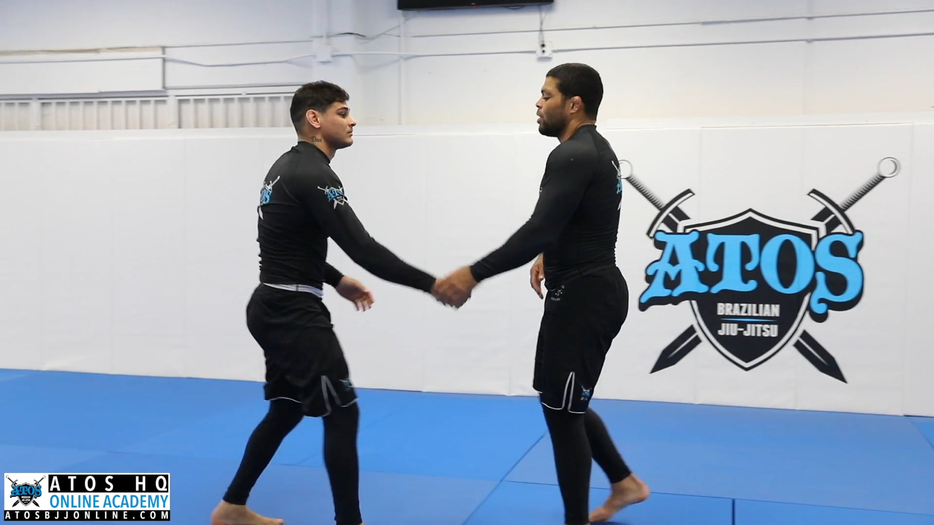 Over-under double leg takedown