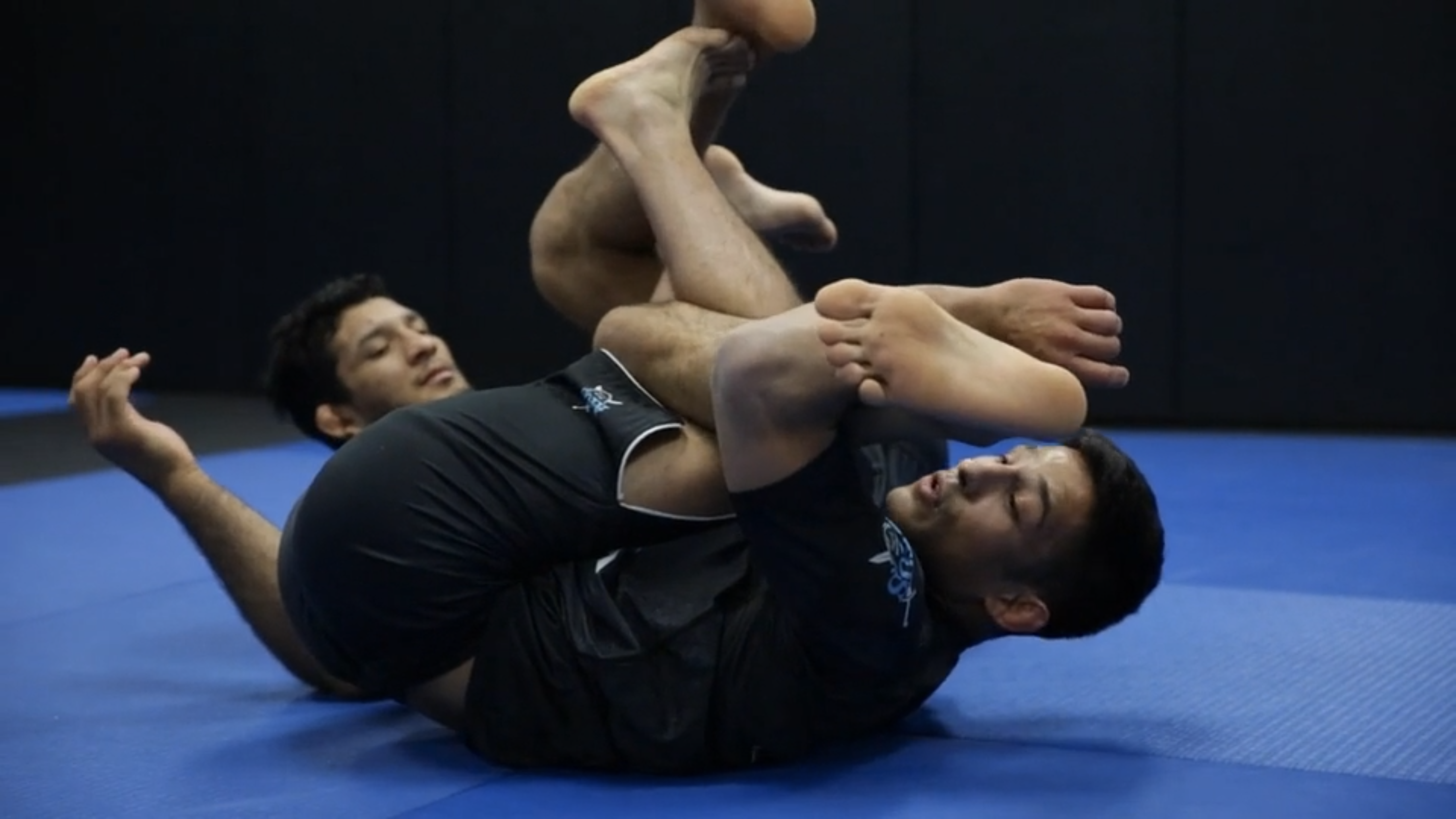 Taking the Back From the De la Riva Ankle Lock Using the Berimbolo 