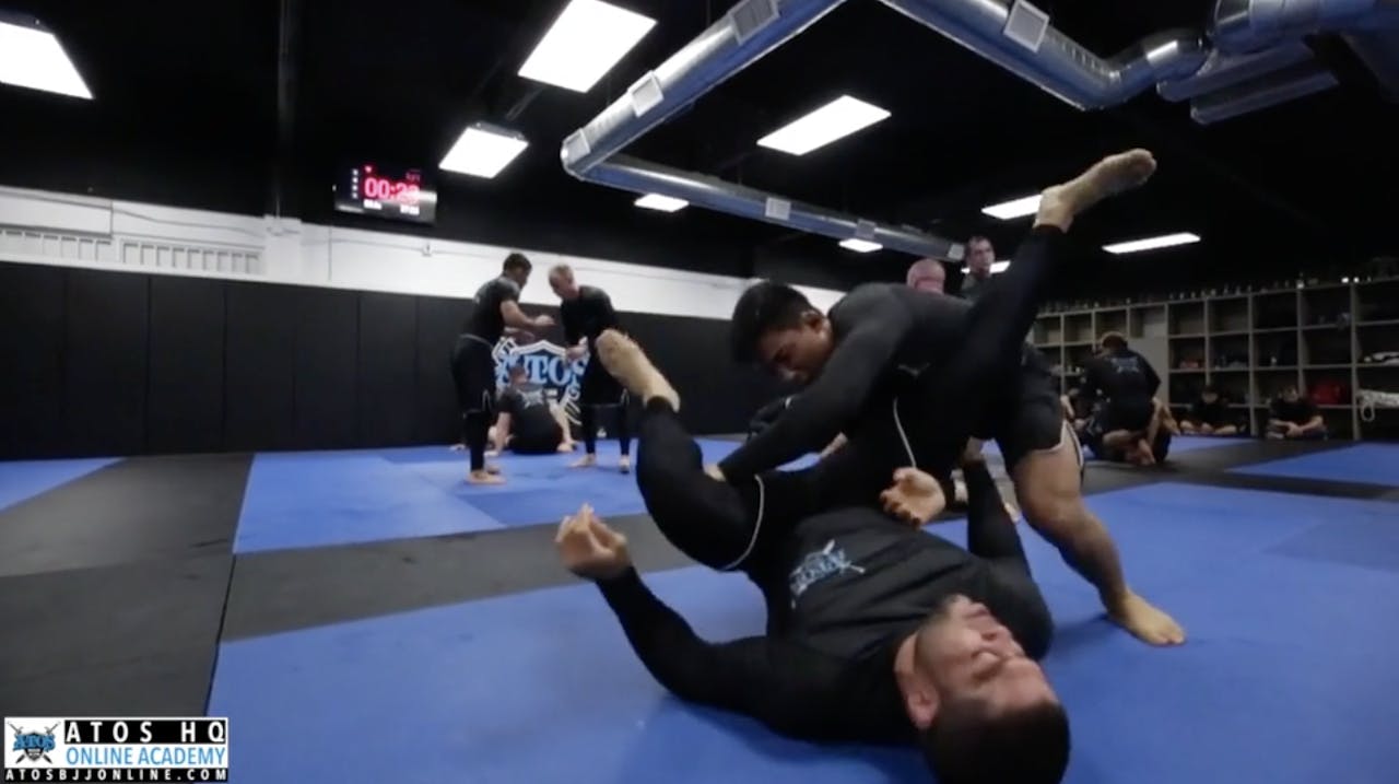 Andre Galvao Rolling With One of His Black Belt Students Andy Murasaki