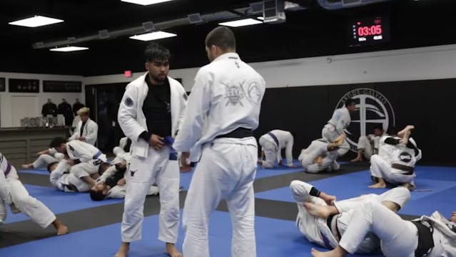 Andre Galvao Rolling Against a Blue Belt