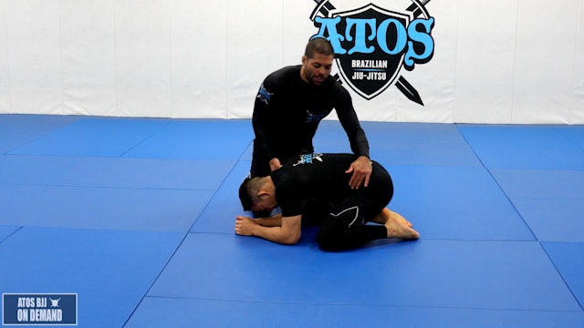 Crucifix to Reverse Omoplata Submission