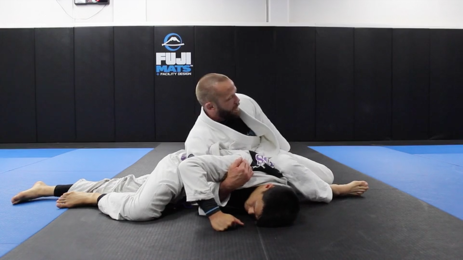 Finishing the Omoplata Using the Lapel Grip