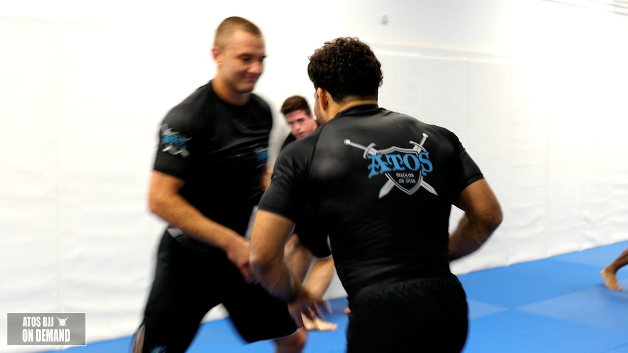 Andre Galvao Rolling With One Of His Black Belts Brad Sparring