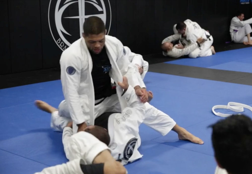 Andre Galvao having Fun With One of His White Belts Neil Sanderstorm 