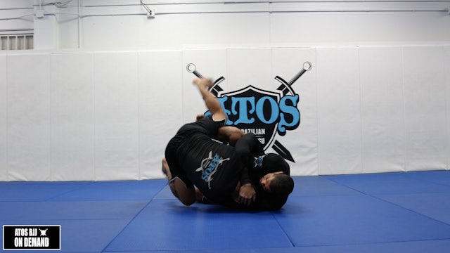 Butterfly Sweep with a High Elbow Guillotine Submit