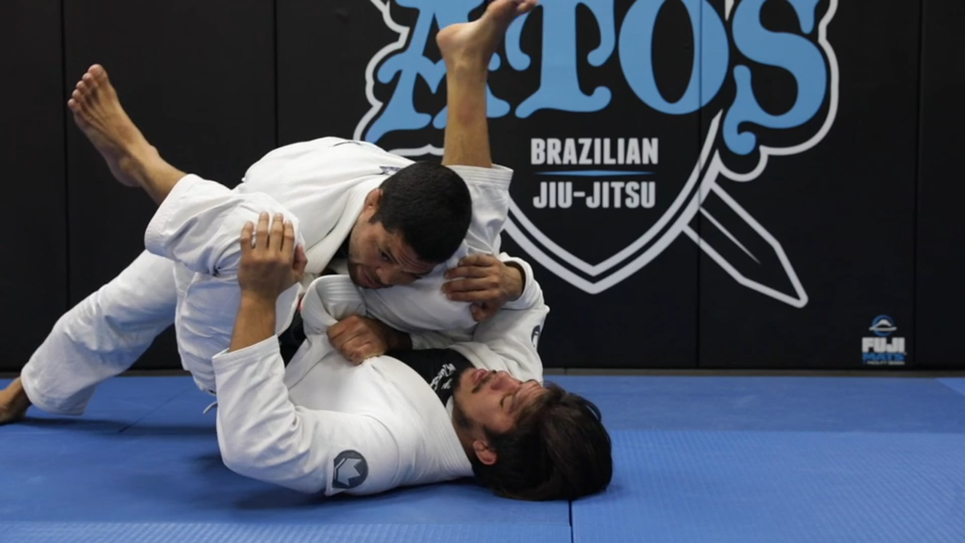 Lapel Sweep on the Outside of the DLR With Transistion Into Deep Half Guard