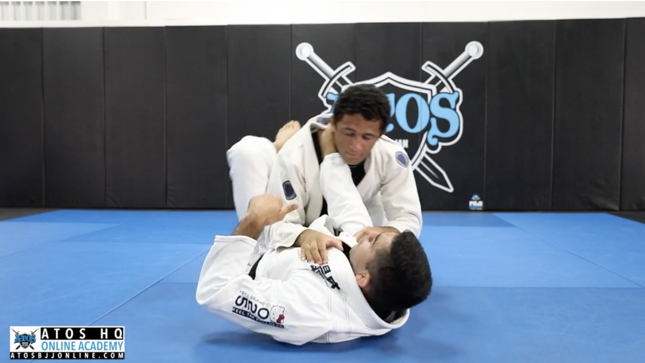 Closed Guard Combo: From Cross Choke To Arm Bar 