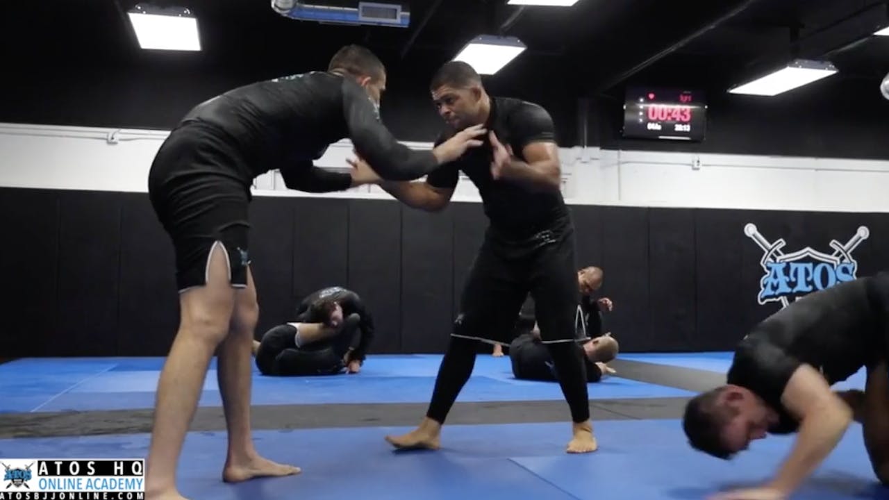 Andre Galvao Rolling With One of His Black Belt Students Rafa