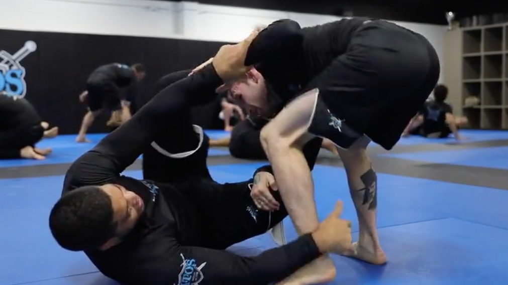 Andre Galvao Rolling With One Of His Black Belts Kristian Woodmansee