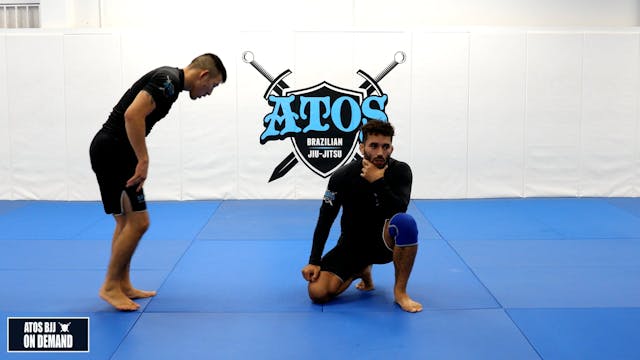 Front Headlock Throw to Anaconda Choke