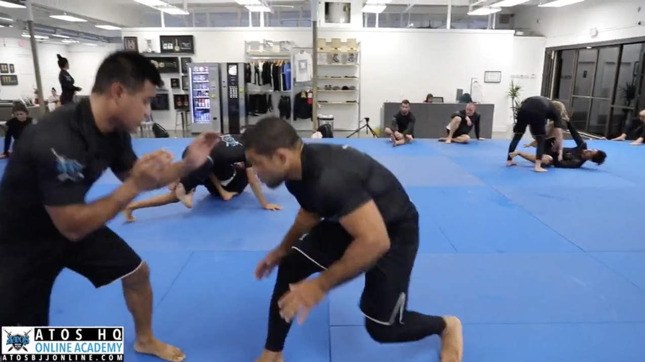 Andre Galvao Having Fun With One of Atos HQ Blue Belts Jhonny Chanda