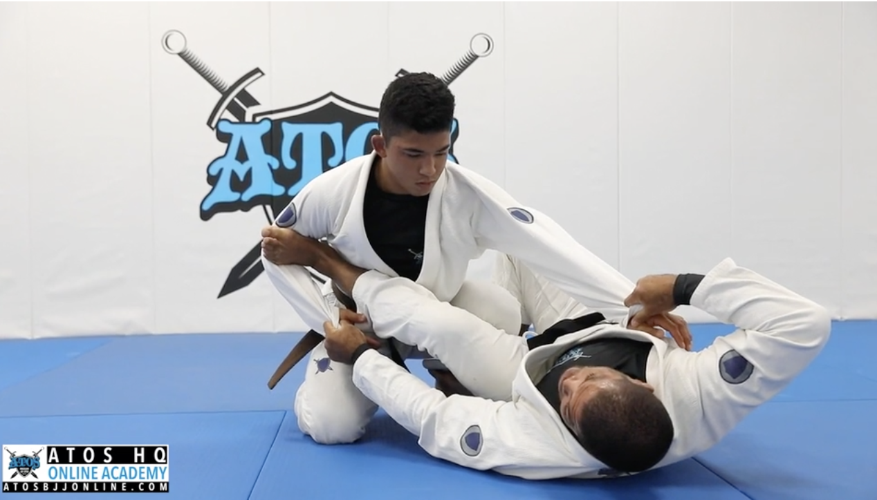 Spider Guard Shin To Shin Omoplata To Arm Bar