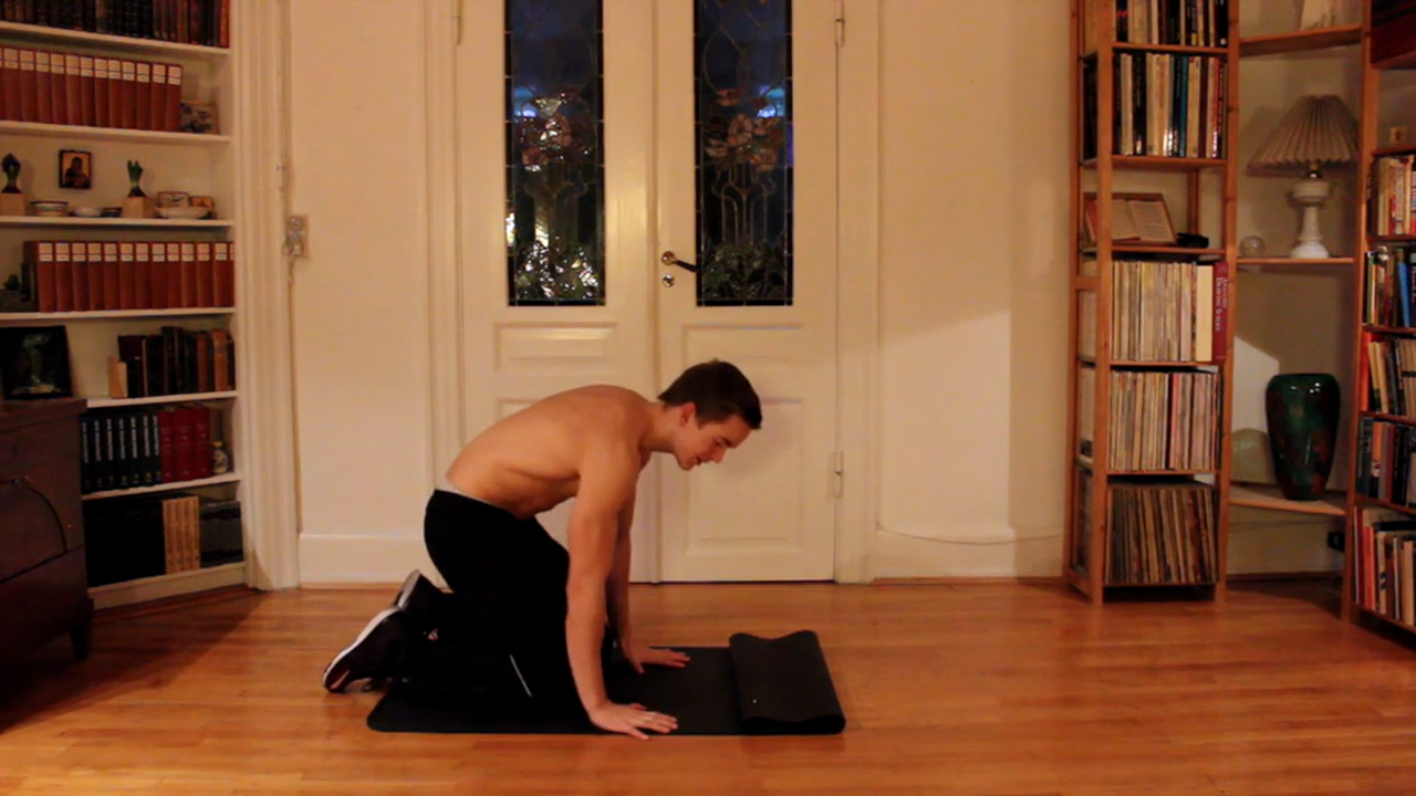 Headstand leg raises