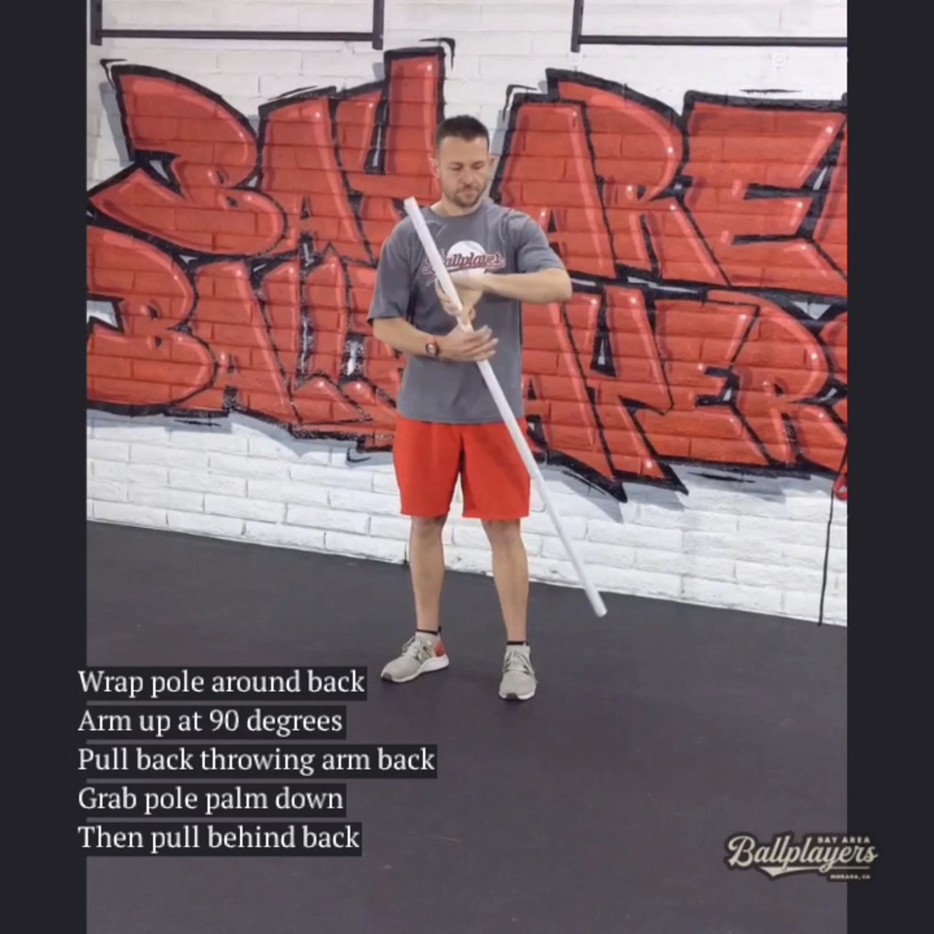 Stick Pitcher's Shoulder Stretch