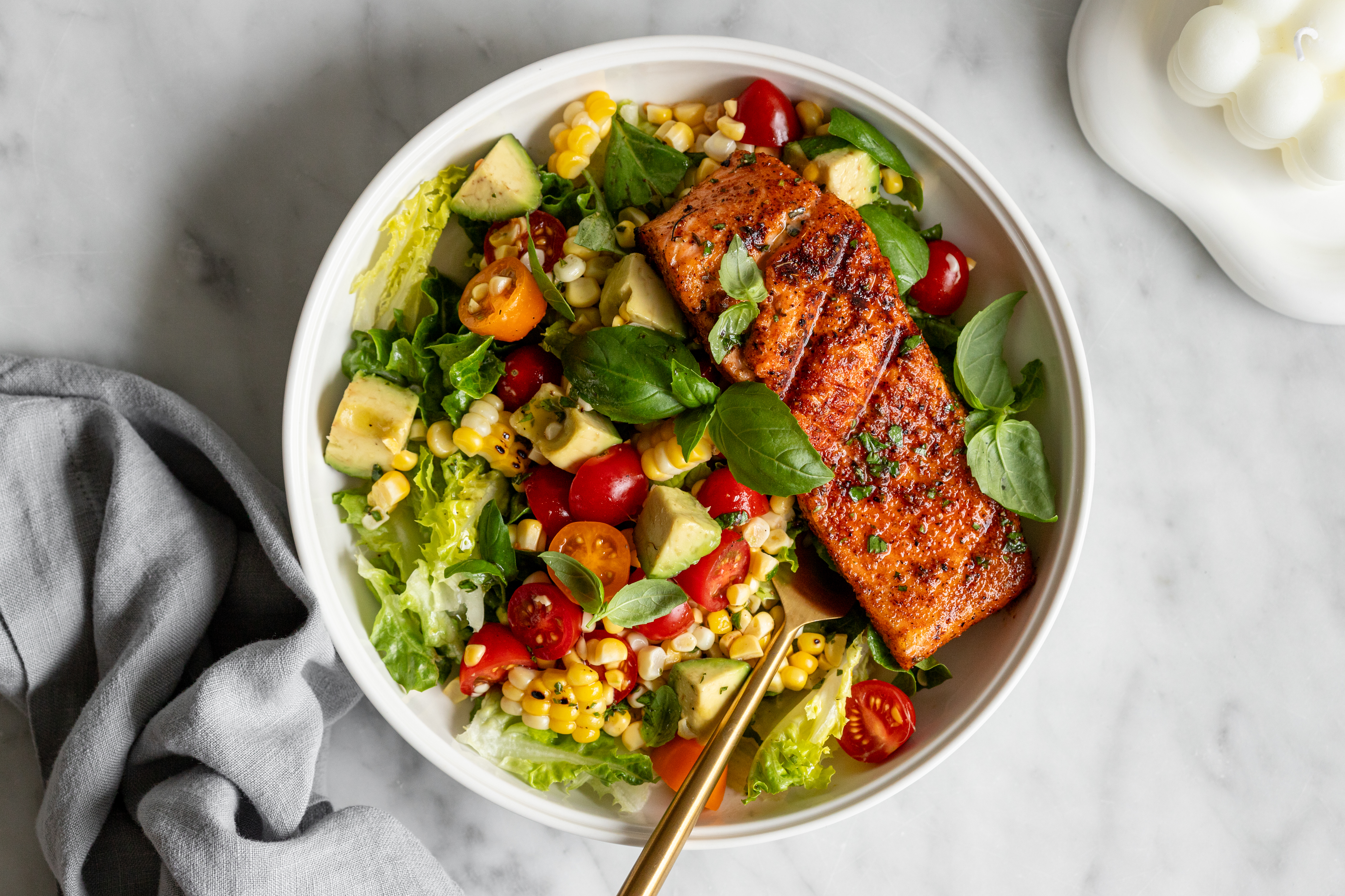 CORN & AVOCADO SUMMER SALAD WITH SPICY SALMON