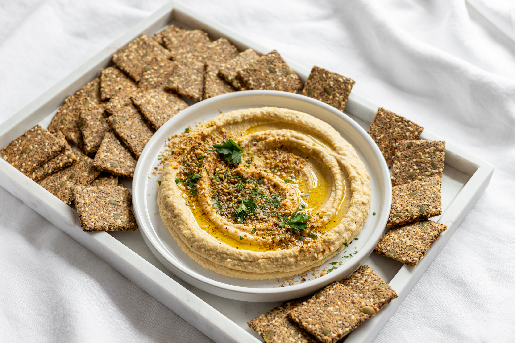 FLAX CRACKERS WITH DUKKAH HUMMUS