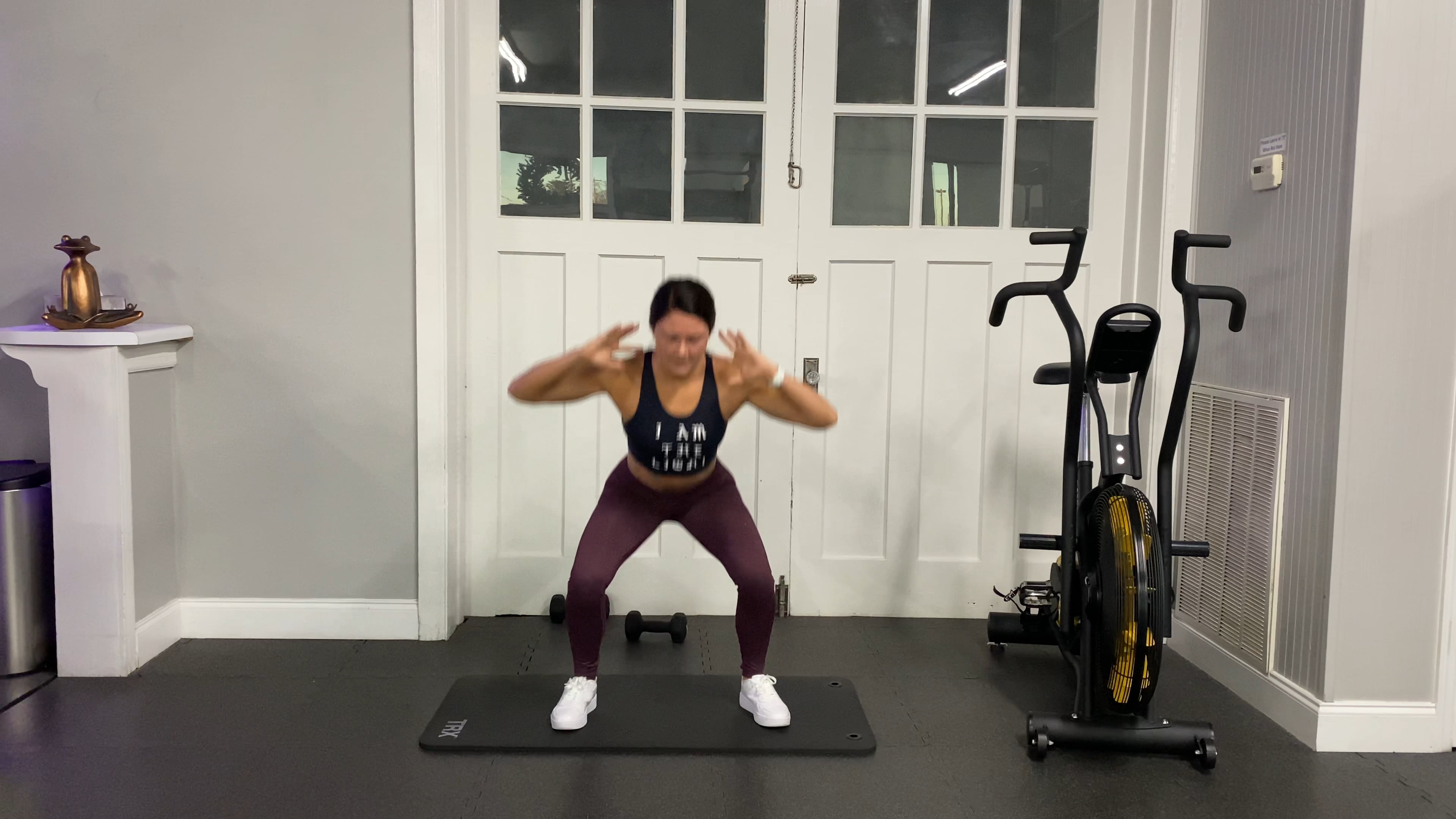 Squat to standing crunch