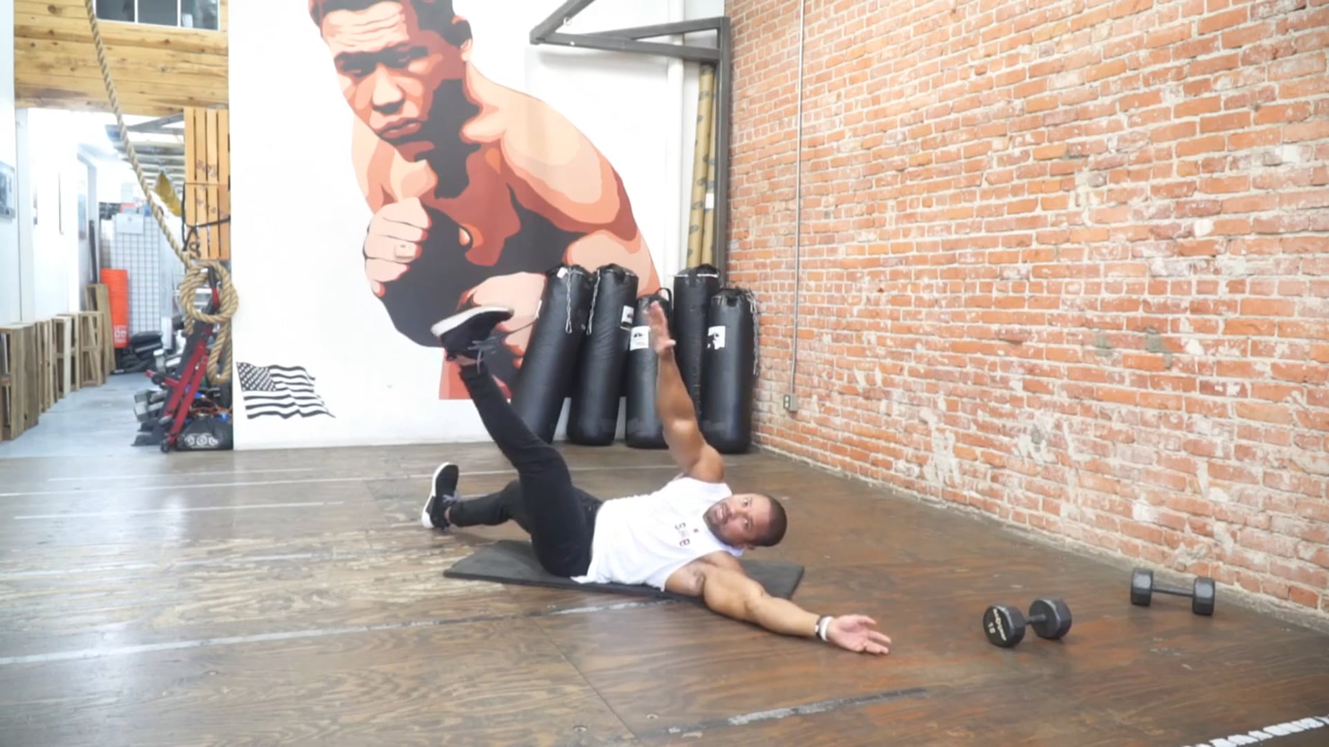 ACROSS BODY CRUNCHES