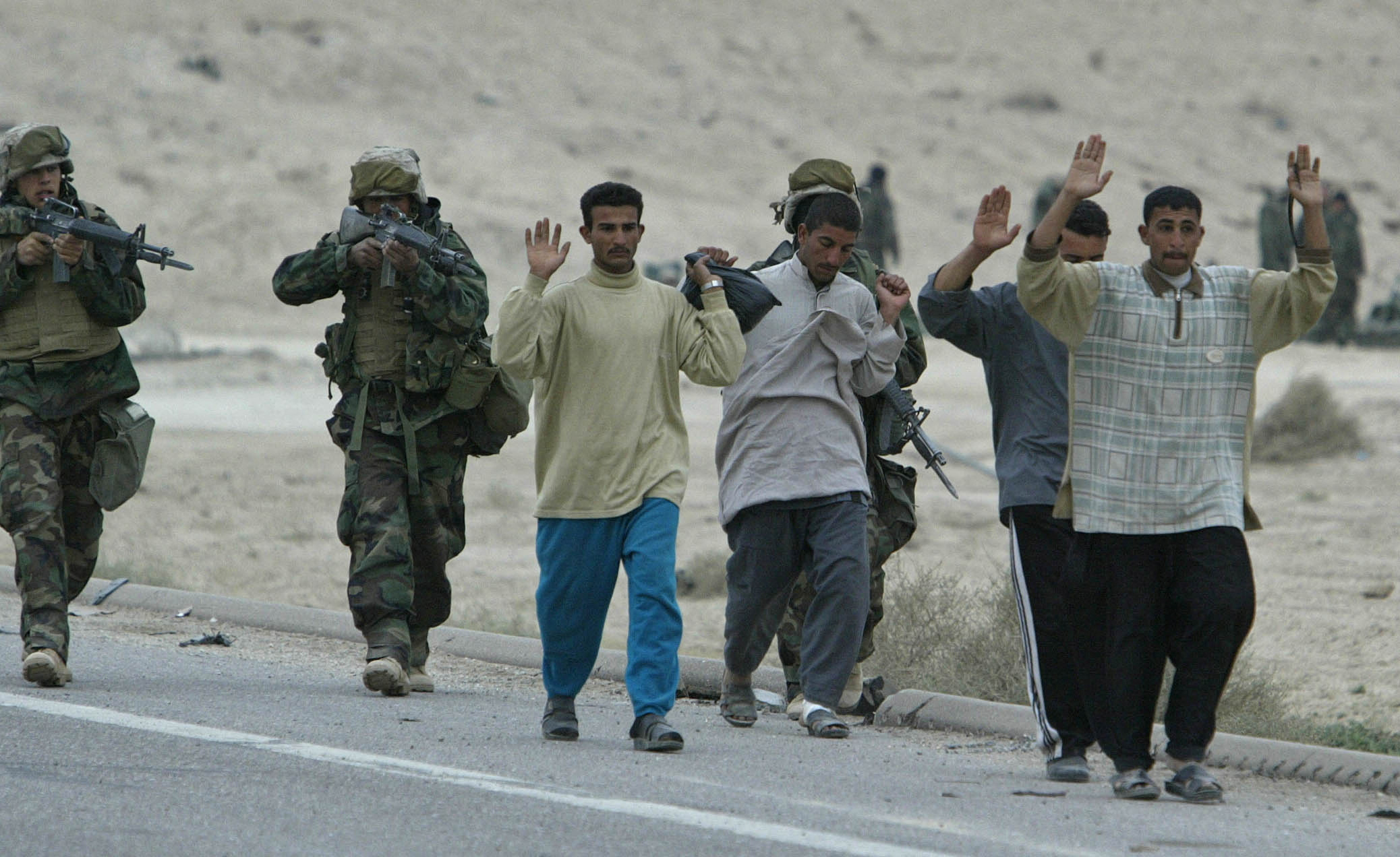 A U.S. soldier and an Iraqi boy