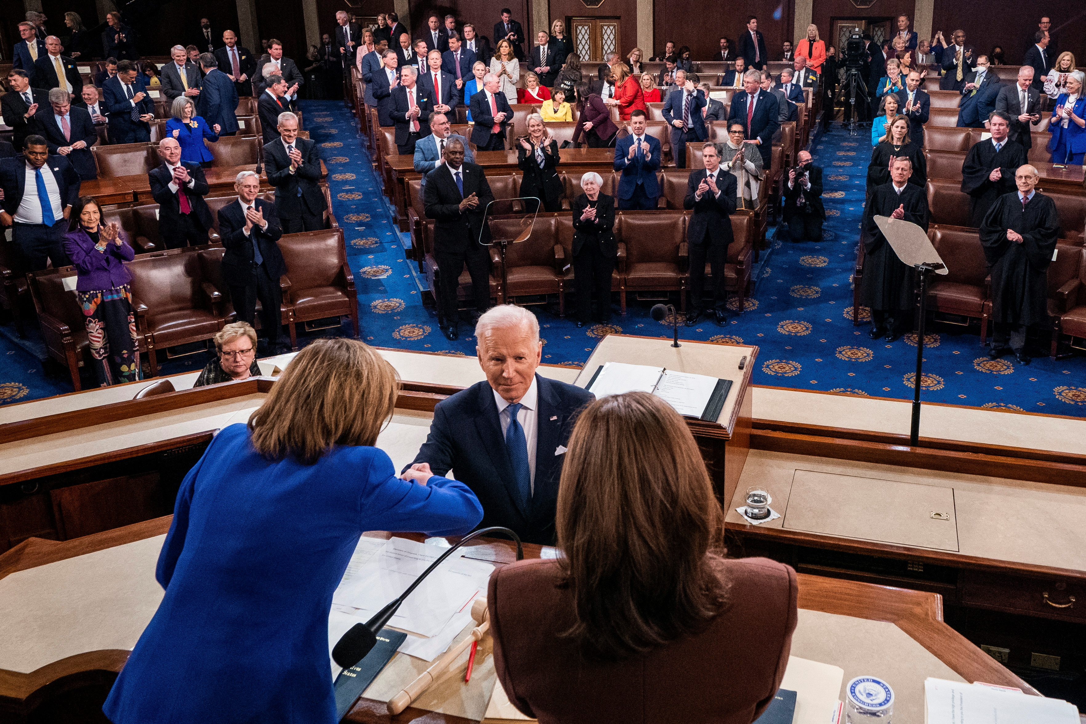 Biden threatens to punish Putin