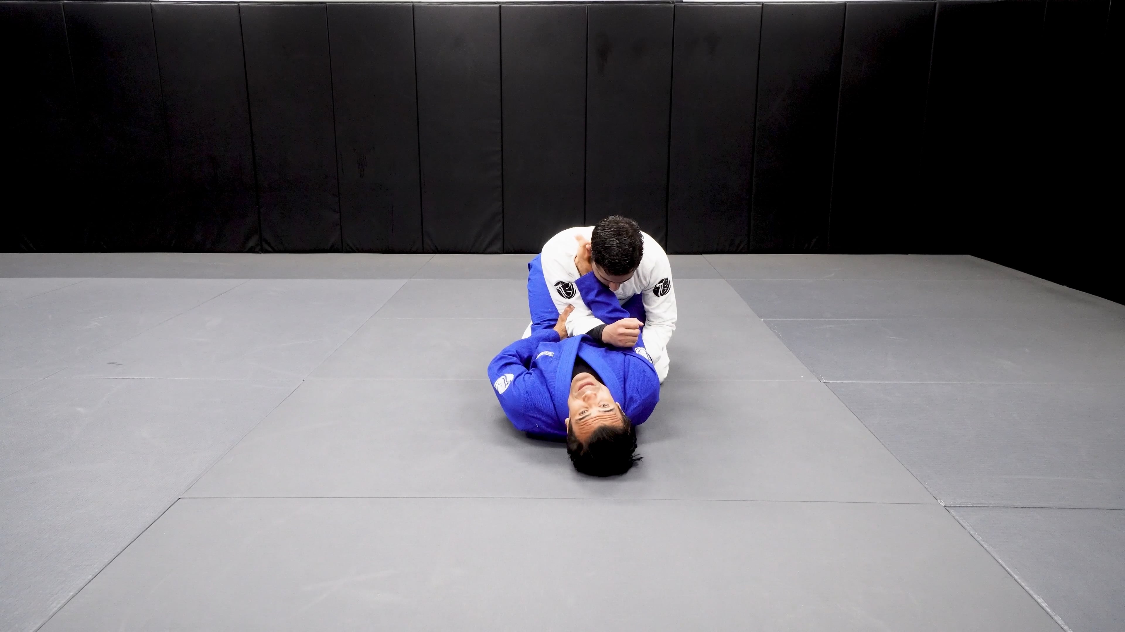 Closed Guard to High Guard Arm Bar