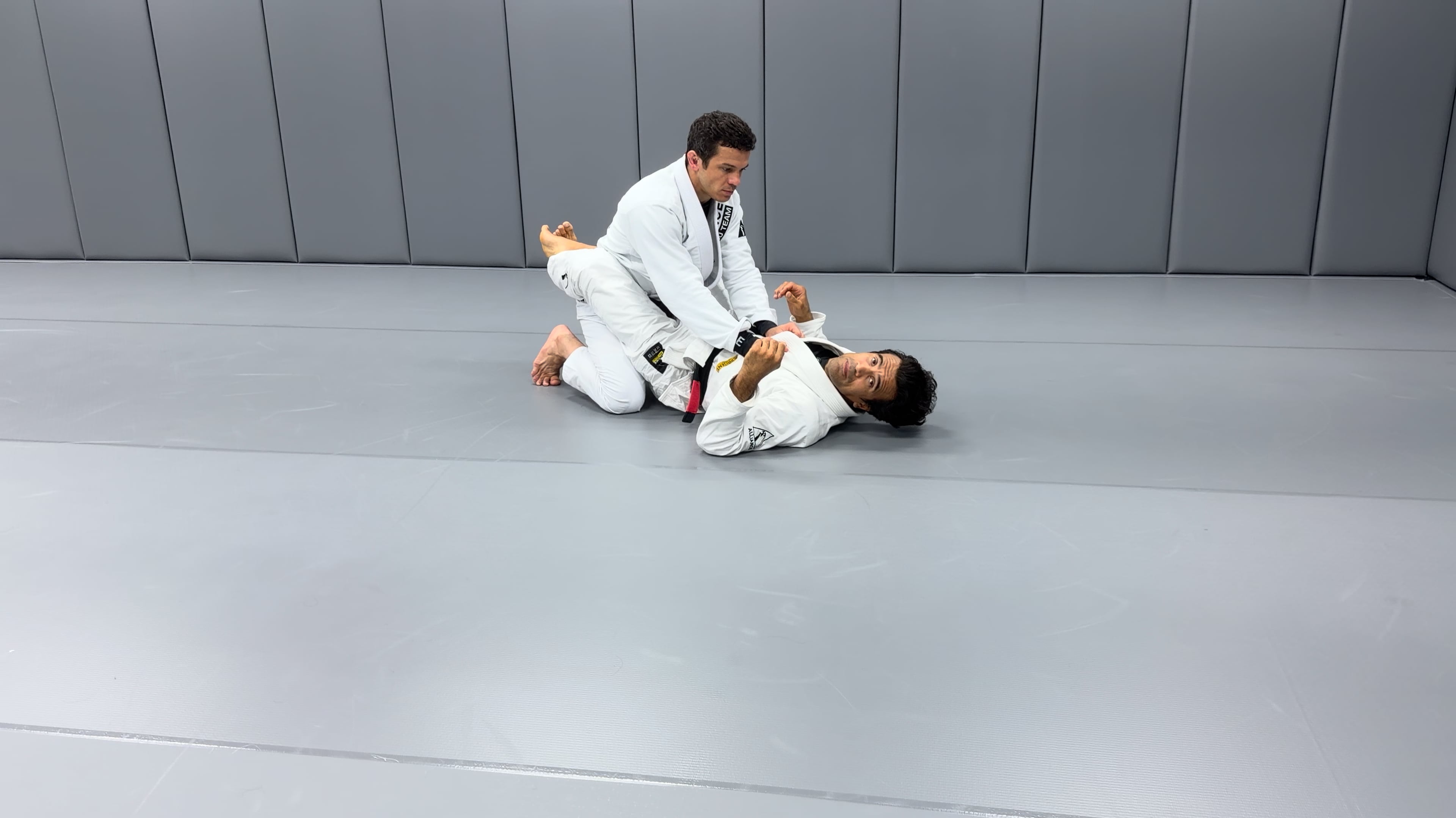 Scissor Sweep Set Up: Two on One Grip Break to Arm Drag