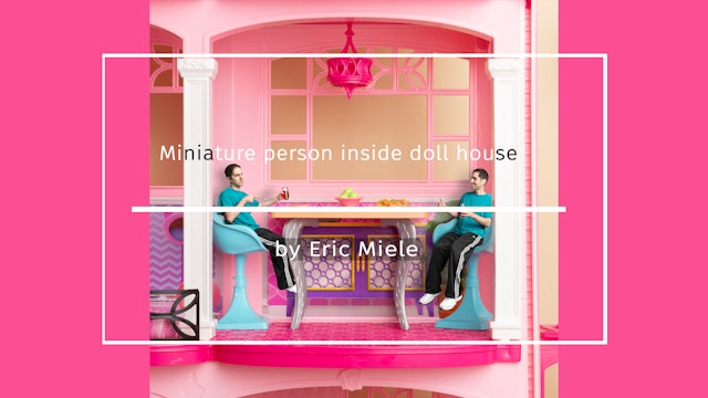 Miniature person inside doll house