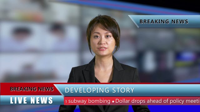 Asian American news anchor in studio ...