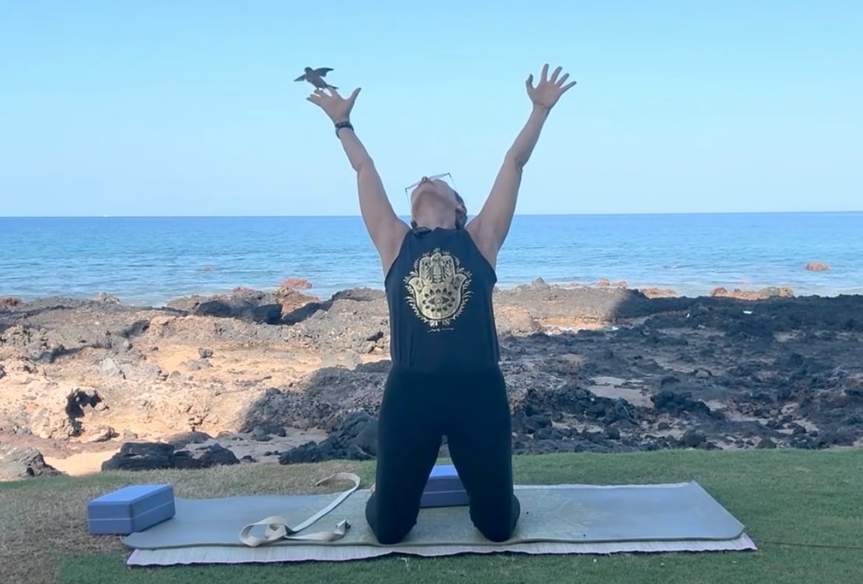 5-16-26 Beach Yoga: An auspicious moment during Beach Yoga — as I reached my arms upward and backward in a stretch, a bird brush