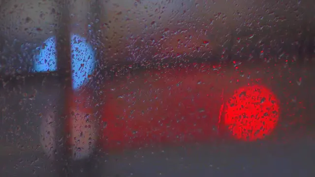 Rainy Night Through Blurred Glass
