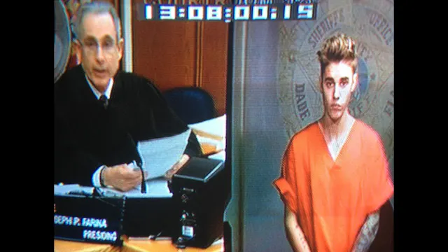 Bieber's Smiley Mugshot, The Costco o...
