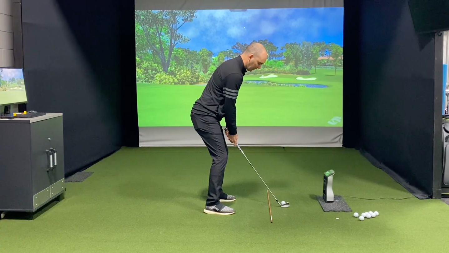 Golf posture balance drill