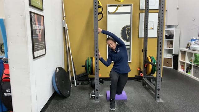 Half kneeling lateral line stretch