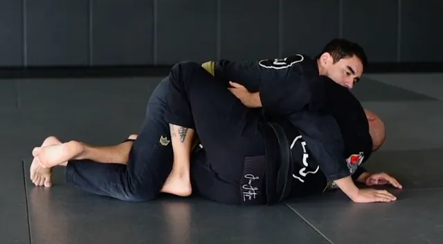 HALF GUARD RETENTION: BUTTERFLY HOOK