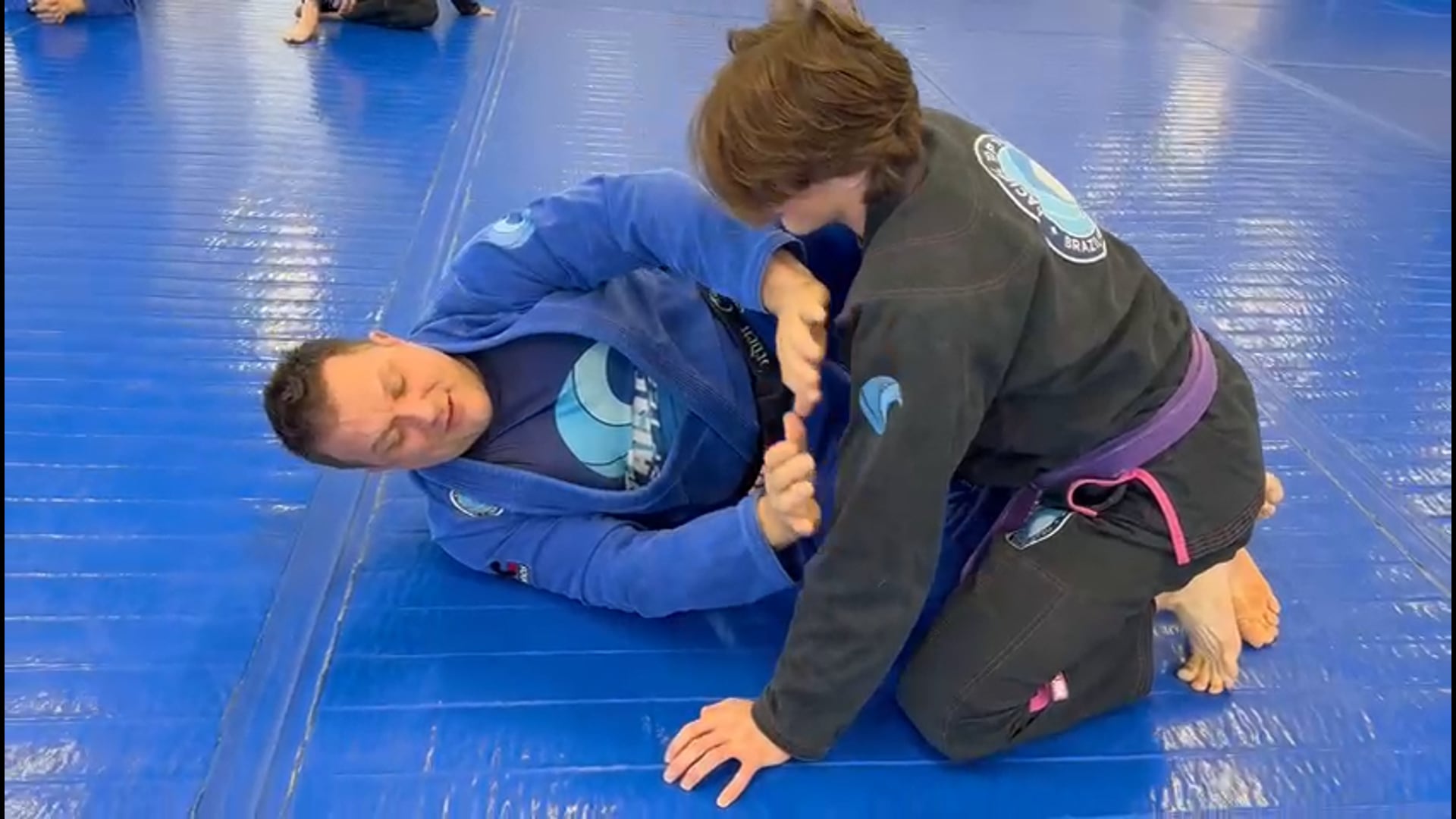 HALF GUARD SCISSOR SWEEP