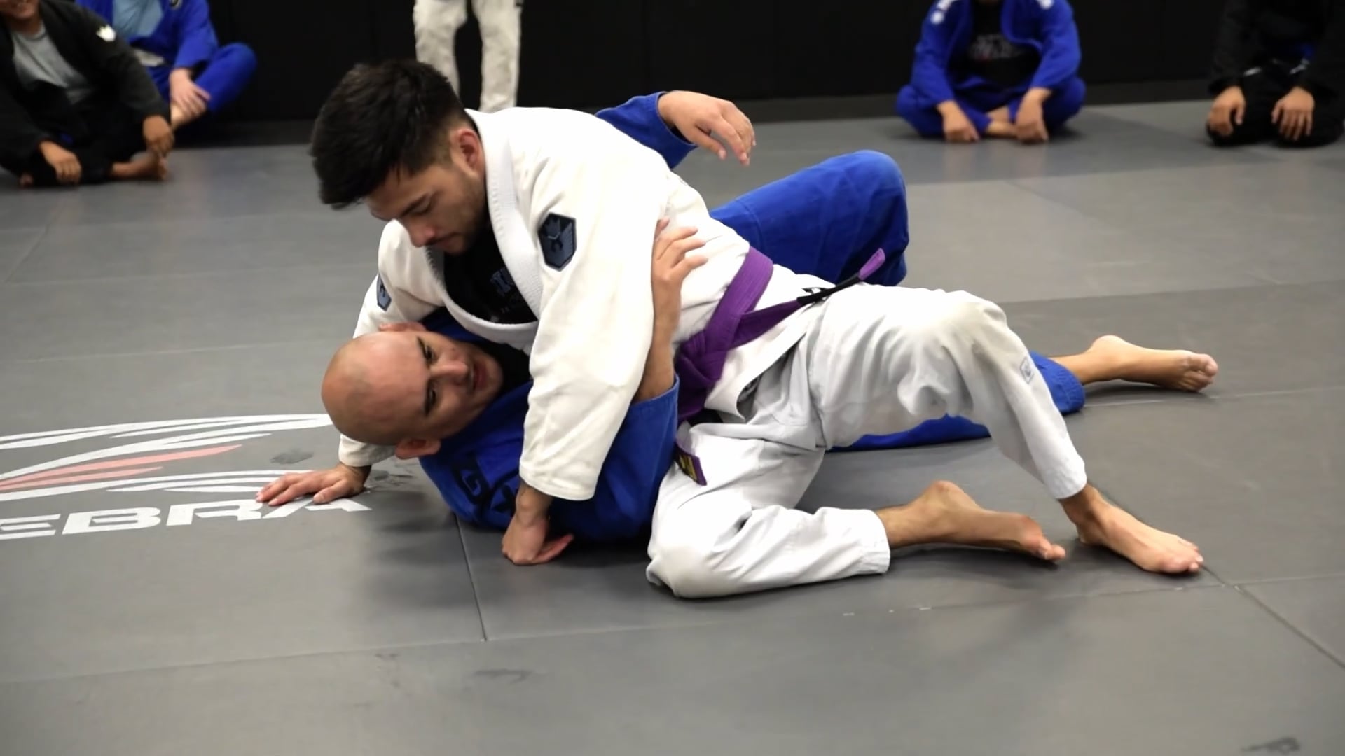 4. HEADLOCK ESCAPE BRIDGE AND ROLL