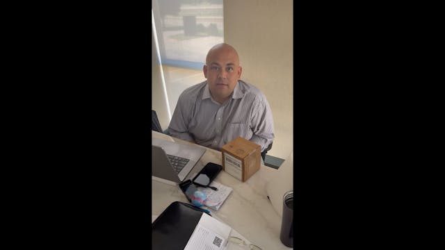 Vince opening a gift 
