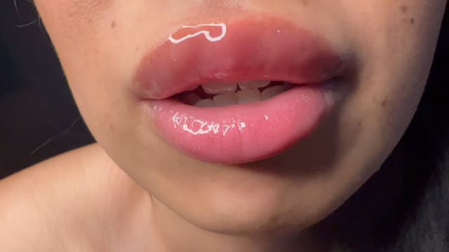 Sensual lenslicking close up