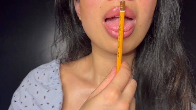 Sensual play with a pencil