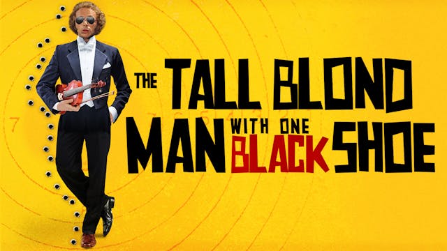 The Tall Blond Man with One Black Shoe