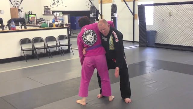 Rear Side Clinch- Knee Trip