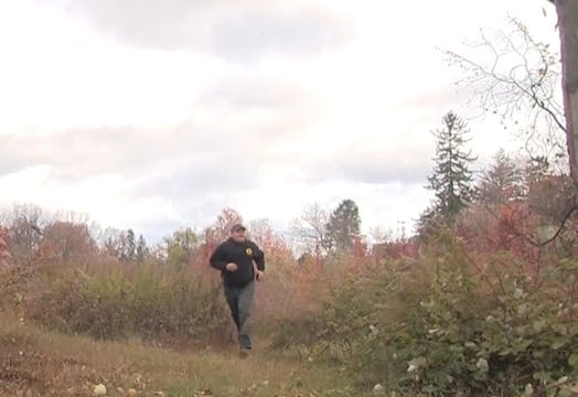 Zac Gidney hustles to his set to disc...