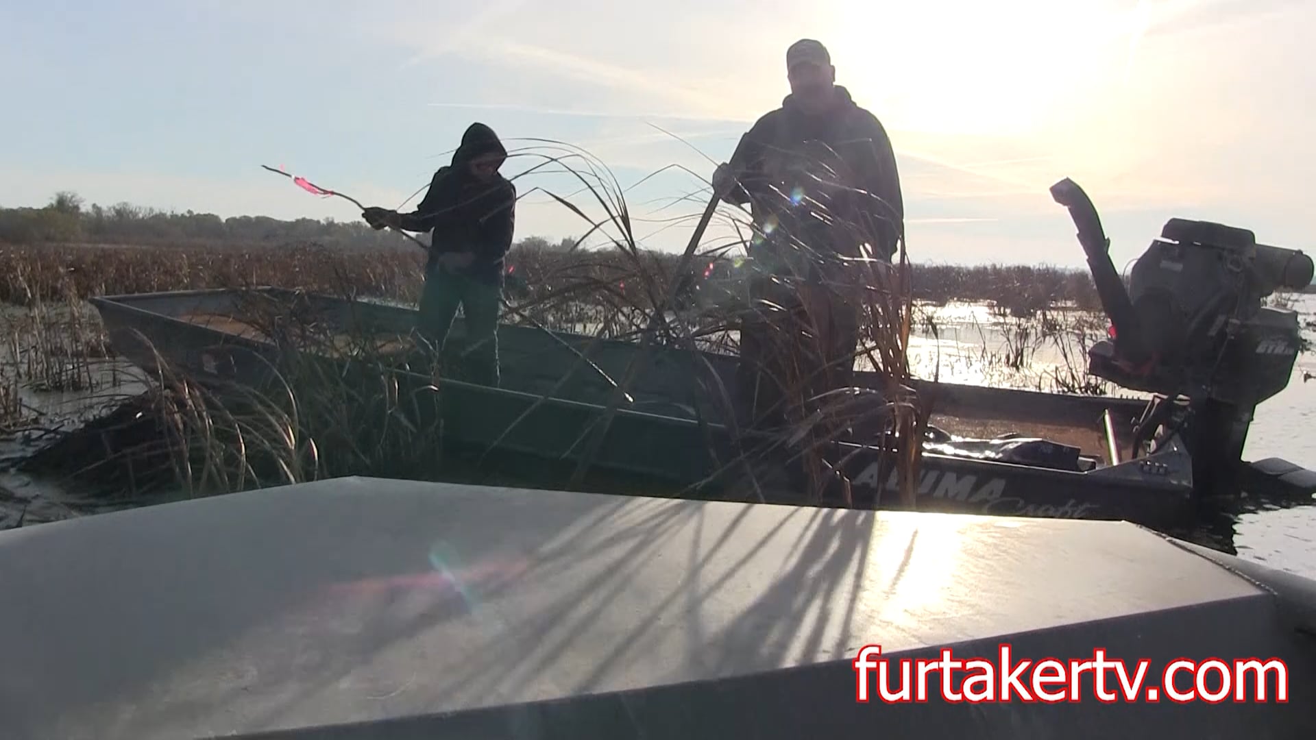 Father-Son Traps Muskrats on an Iowa Marsh