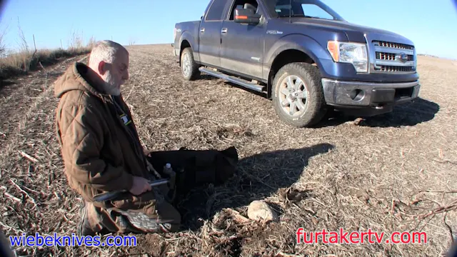 Mark Steck shows a "rock set" for coy...